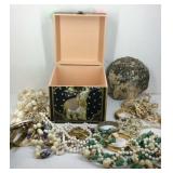 Jewelry box with costume jewelry and a large