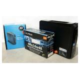 Three pieces. Motorola cable modem in box, i/o