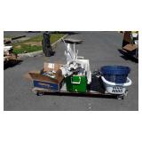 Skid with box of DVD movies, skis with some