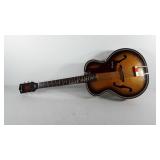 Harmony guitar with steel reinforced neck, made