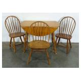 Round drop leaf table, 42" diameter,  and three