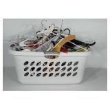 Laundry basket full of hangers.