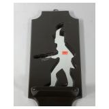 Mirror shelf with soldier silhouette design,