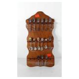 Wooden spoon rack with miniature spoon