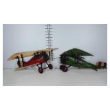 Pair of metal Sexton airplane wall hangings