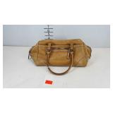 Coach purse, small stain on bottom