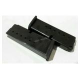 Two 9mm magazines. Hold 7 rounds.