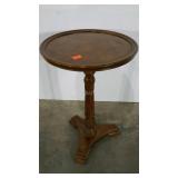 Plant stand with carved details. 15" diameter and