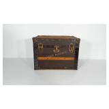 Old trunk with insert. Measures 20x15x13 inches.