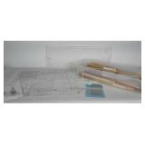 Model ship kit in poly storage box with book and