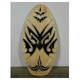 Wood skim board with tribal design, in original