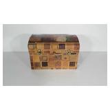 Cardboard trunk with paper covering. Pictures of