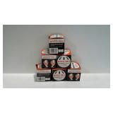 Six new wiffle balls in boxes.