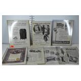 Antique advertisements in protective sleeves,