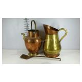 Hammered copper vessels and a spatula