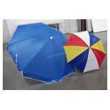 2 umbrellas.  One is a beach umbrella and one is