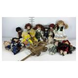 Group of small dolls, male and female,  includes