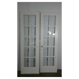 Glass paned French doors. 48" opening and 80"