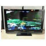 Sony Brava 40" LCD digital tv in stand. No