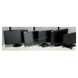 Group lot: three Dell monitors, one Vizio tv and