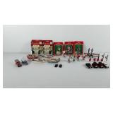 Christmas village accessories and toy cars,