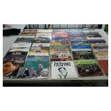 Group of 33RPM records with damaged jackets.