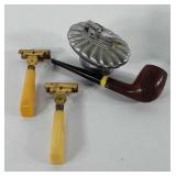 Mixed group, includes lighter, wooden pipe, and