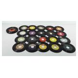 Vinyl records, 45RPM, includes Queen, Elton John,