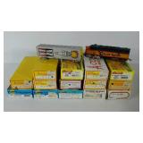 Group of miniature trains, most are boxed