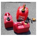 3 gas Cans. 2 gallon, and two 1 gallons