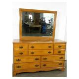 Ten drawer dresser with mirror. 56"×19"×33"