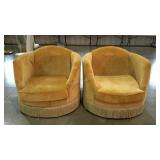 Two oversized upholstered statement chairs. Gold