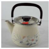 Tea kettle with floral design