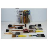 Paint brushes, putty knife, and scraper