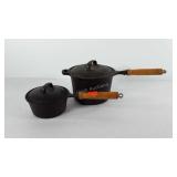 Kitchenwares, two lidded cast iron pots with
