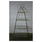 Four tiered etagere with glass shelves in