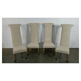 Low seat, high backed upholstered chairs, casters
