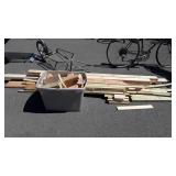 Tote and group of scrap lumber