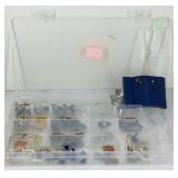 Costume jewelry in plastic divider
