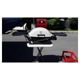 Weber gas grill with poly portable table, clean