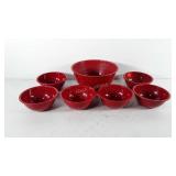 Enamelware, large bowl and six small bowls