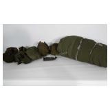 Military sleeping bag, belts and canteen holders.