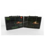 Two tackle boxes full of fishing supplies,