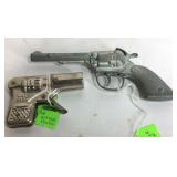 Toy guns, tin water  pistol and Gabriel pistol