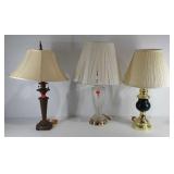 Group of lamps, one with decorative glass base,