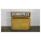 Two piece Harmony House cabinet. Base is single