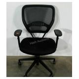 Mesh backed office chair, adjustable height and