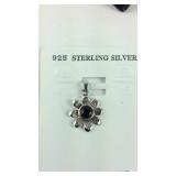 Sterling silver floral pendant with stone