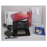 Nintendo DS Lite with charger powers on with