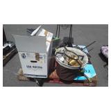 Skid lot: folding table, cat litter pan, helmets,